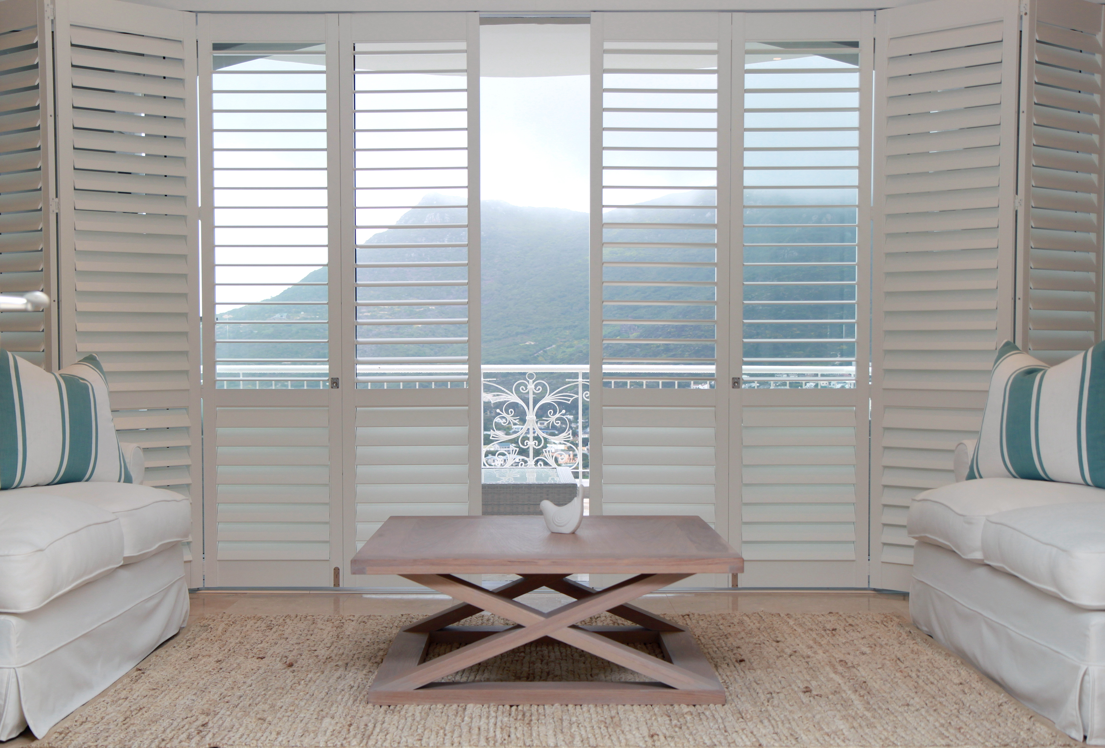 Woodlore® Premium Hardwood Shutters with wide louvers